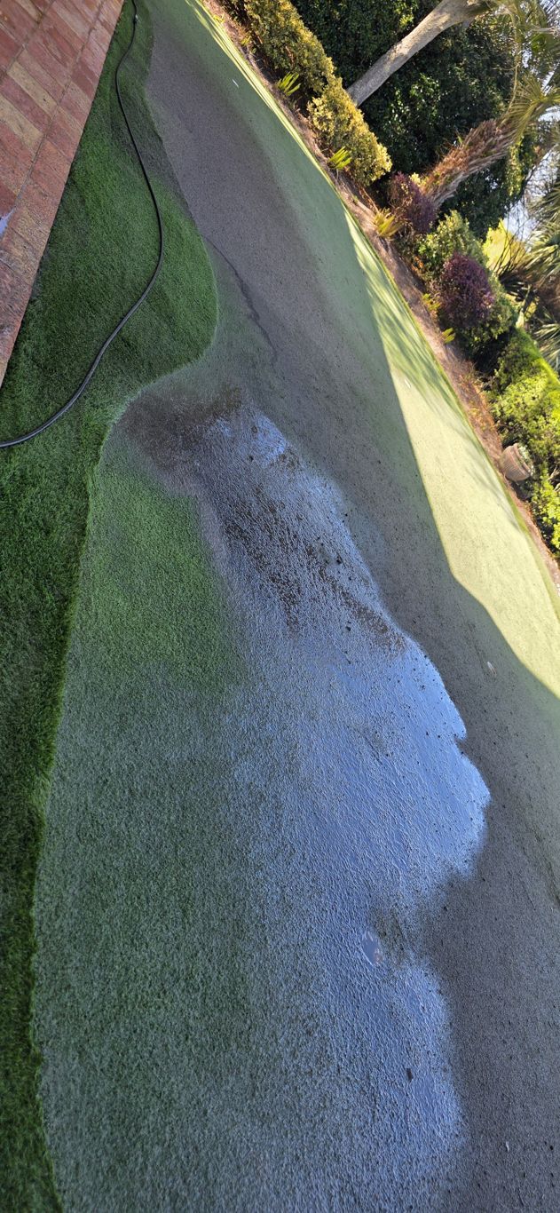 Putting green turf cleaning in progress at a Hilton Head, SC home