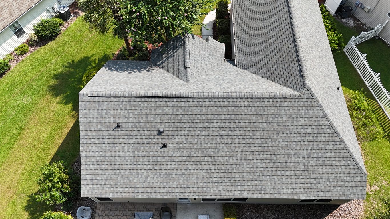 Streak-free shingle roof after soft washing, aerial view in the Lowcountry